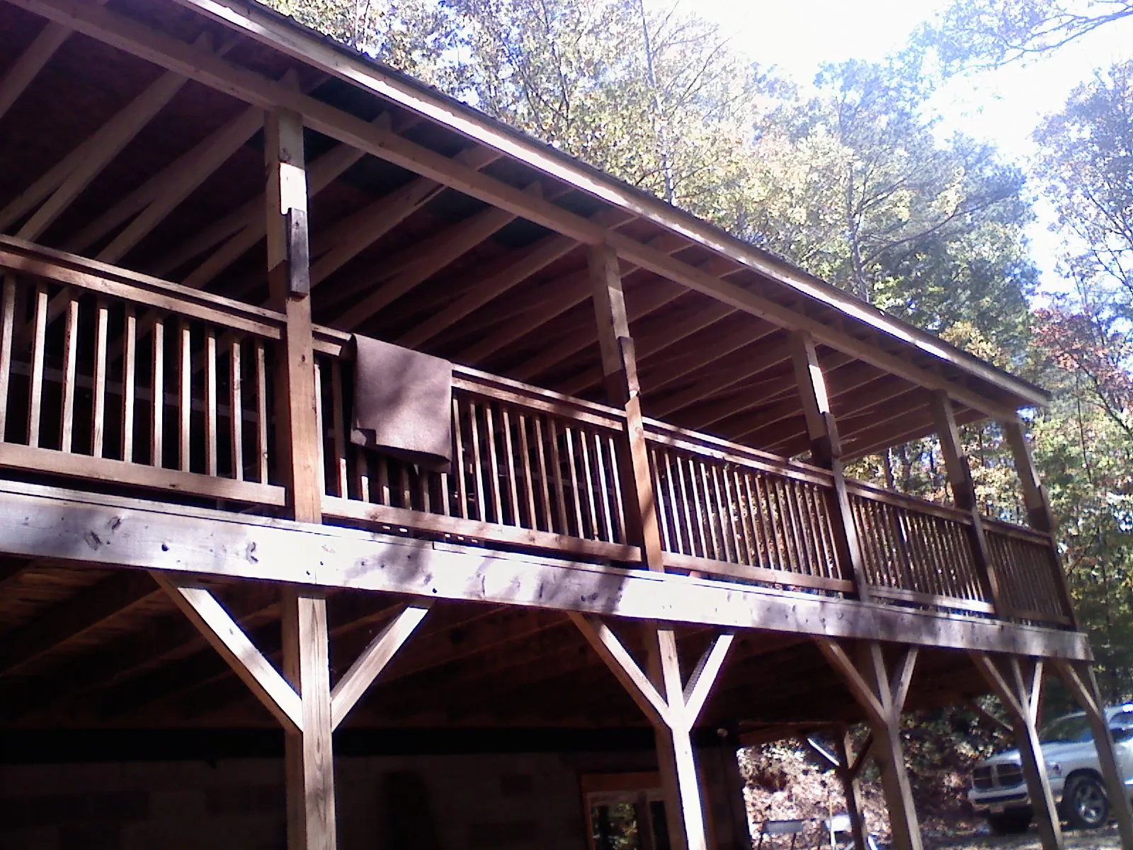 Timber framing under a new elevated porch and deck — Roof Leak Repair in Fort Hill by Roofing Brothers